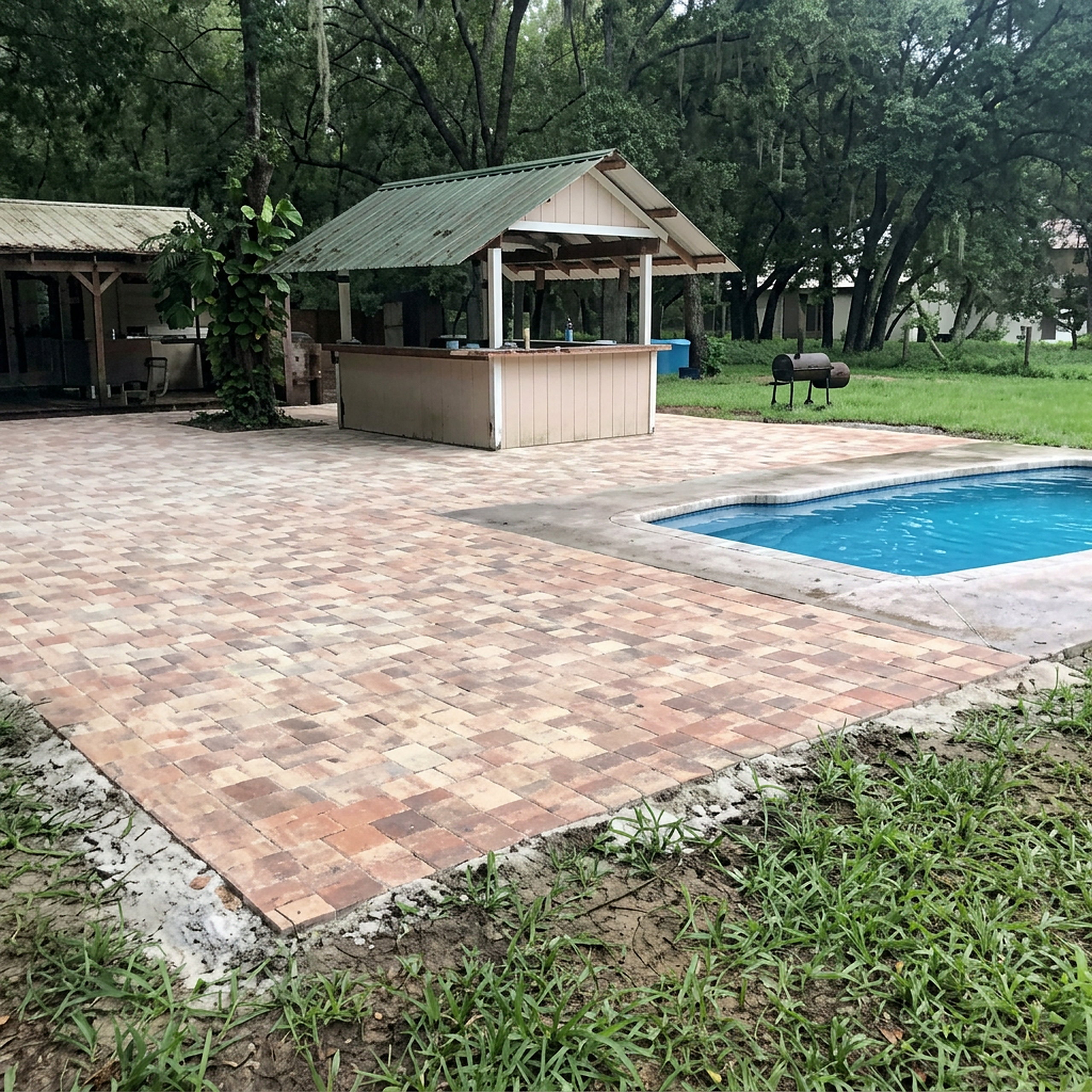 Paver pool deck with cabana