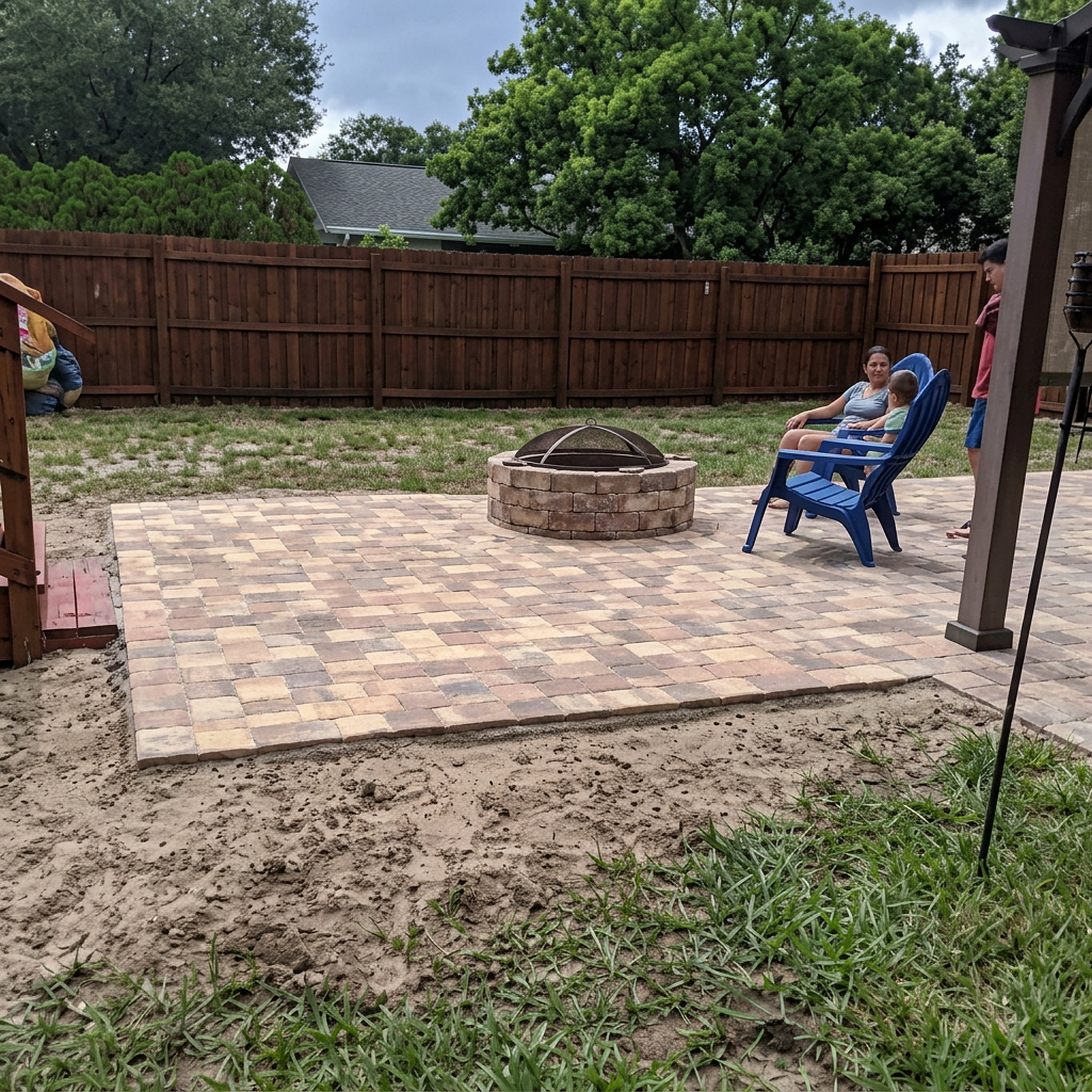 Keyhole paver patio with center fire pit