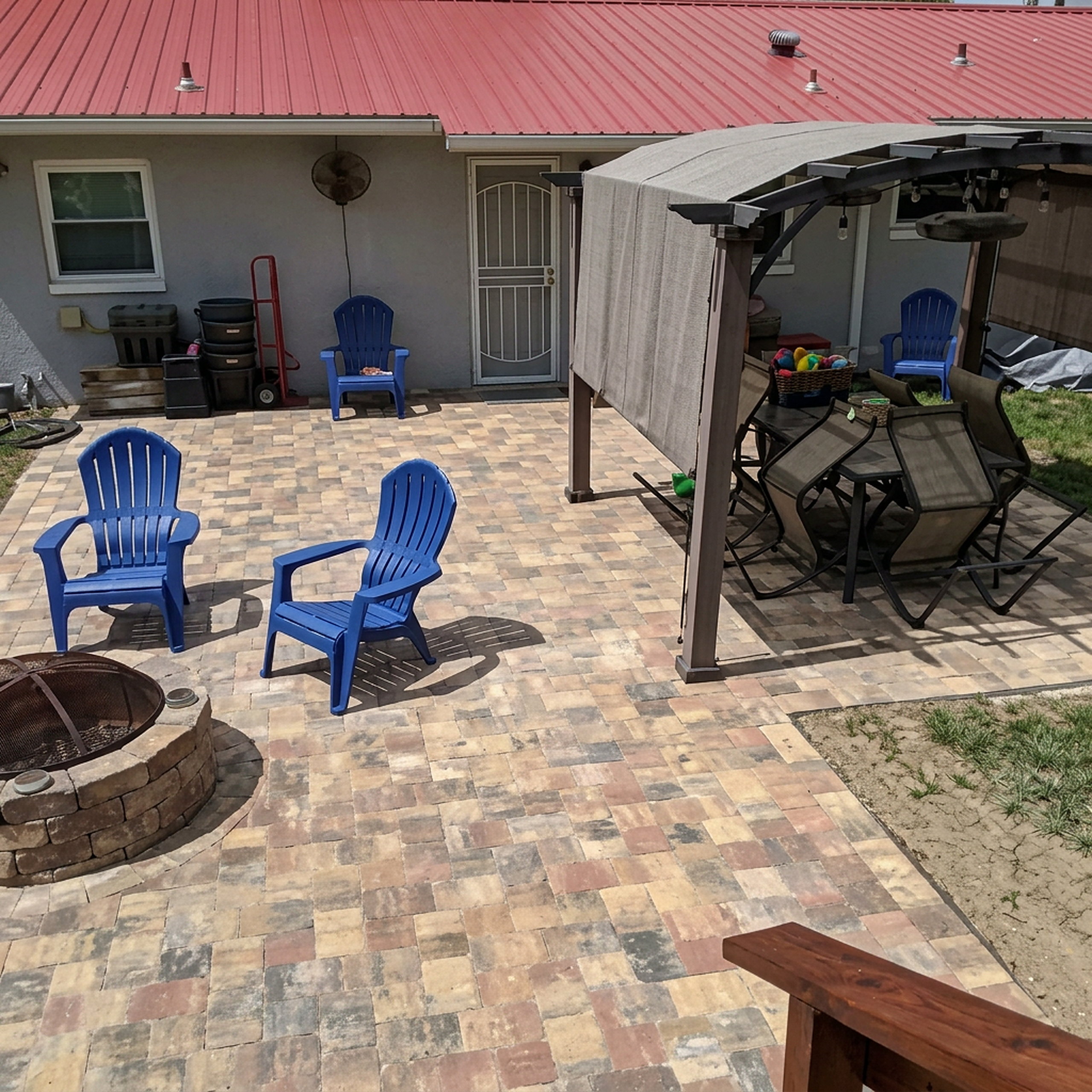 Keyhole paver patio with fire pit, pergola and seating