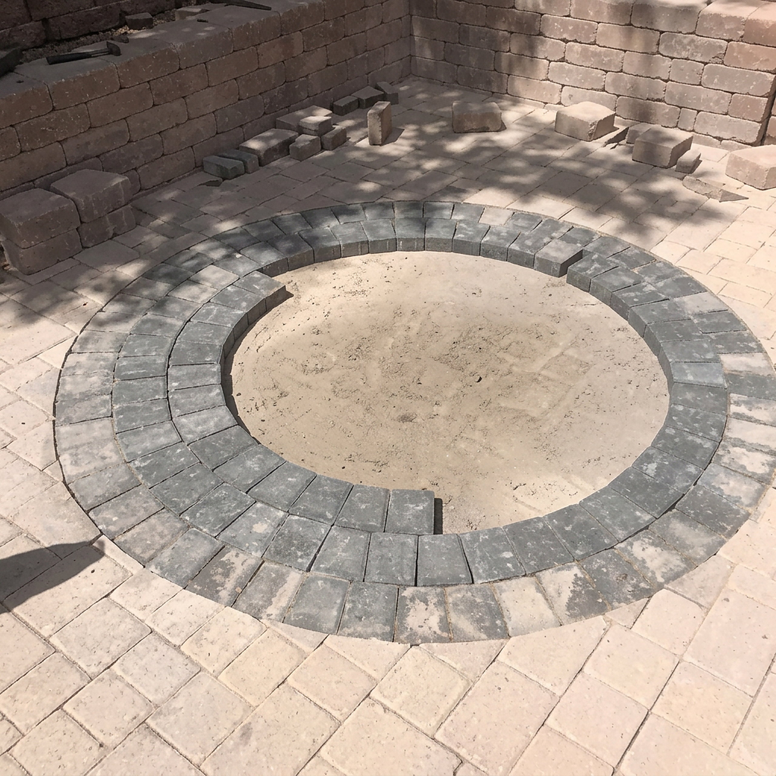 Custom round paver fire pit medallion detail